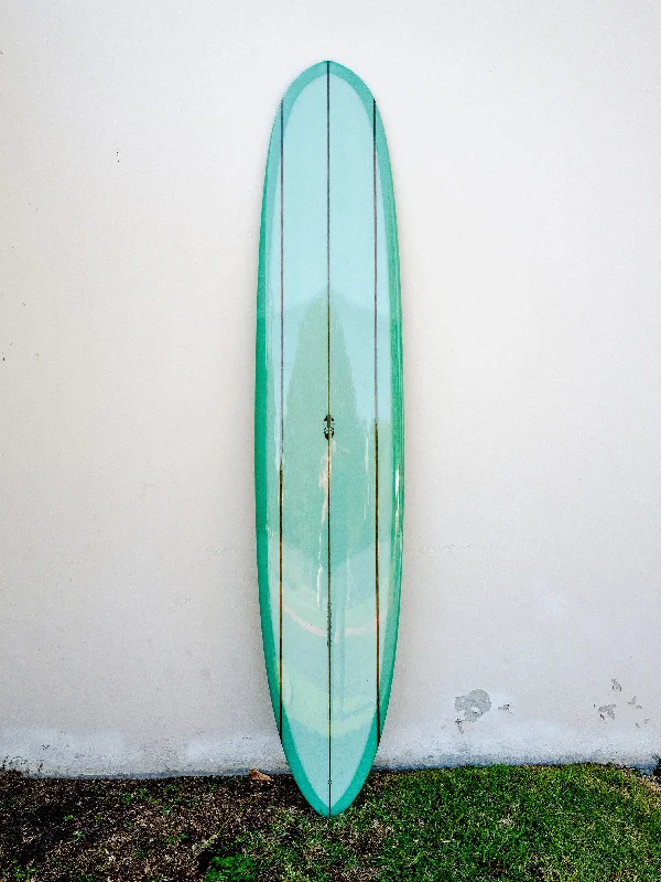 surfboards for fast ocean conditions-Tyler Warren | 9’7” Triple Stringer Pintail Nose Rider Sea Foam Gloss Longboard